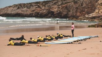 surfers-on-beach